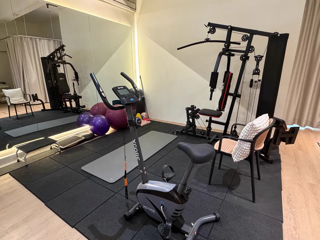 Rehab gym area with exercise equipment